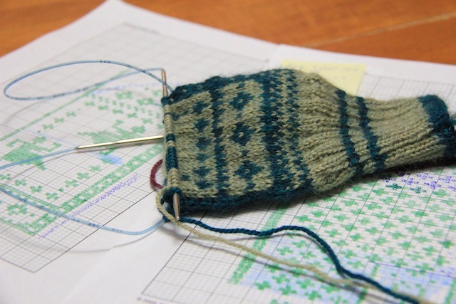 About a third of the way through the hand.