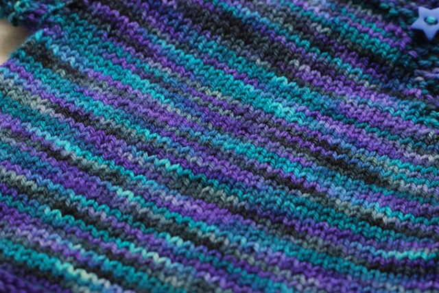 I think it's the black-ish bits that make me think camo. Otherwise, it's all soft and shifting teals and purples, which I love.