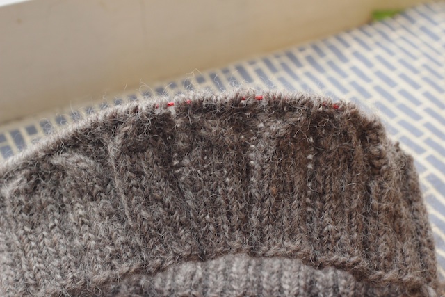 I guess there was too much halo for the cables. I still think this yarn will make a toasty hat.