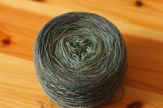 Despite the greys in the photo, this is knitting up to look just like tarnished copper. 