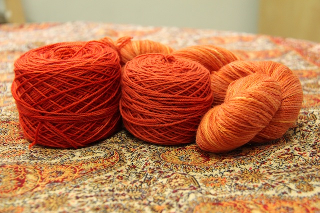 Left to right: Indigodragonfly Merino Sock in "Safety Pin or Safety Pint: Discuss" for Willowherb; Quince & Co. Finch in "Nasturtium" for Grace; and Indigodragonfly Bleats, Shoots & Leaves in "Baldersquash" for Daphne.