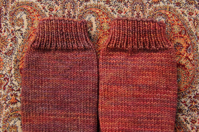 Weirdly, both cuffs/legs of the socks were knit from the same skein, despite looking totally different. The feet (top photo) are different dyelots, though.