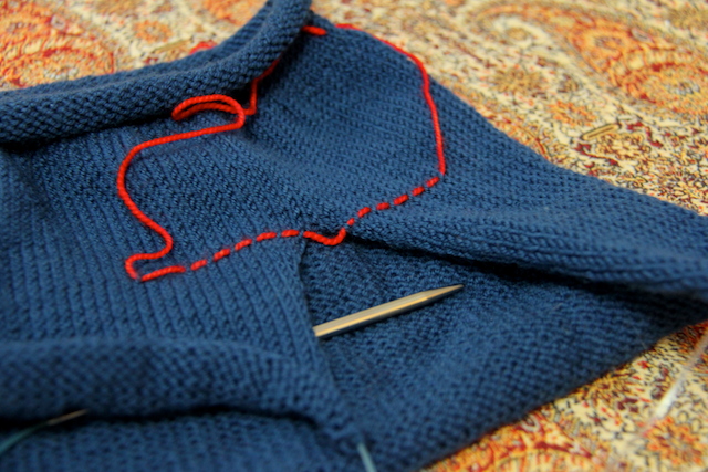 Pocket split. The red is there to give me a clear place to measure from (for some reason, I'm terrible at counting rows as I go.)