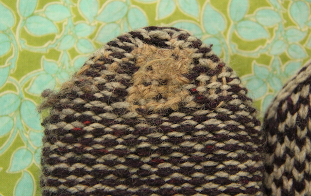 I wear through this part of all my mittens far more quickly than any other part. When he thumbs started to get threadbare, I knit myself a new pair.