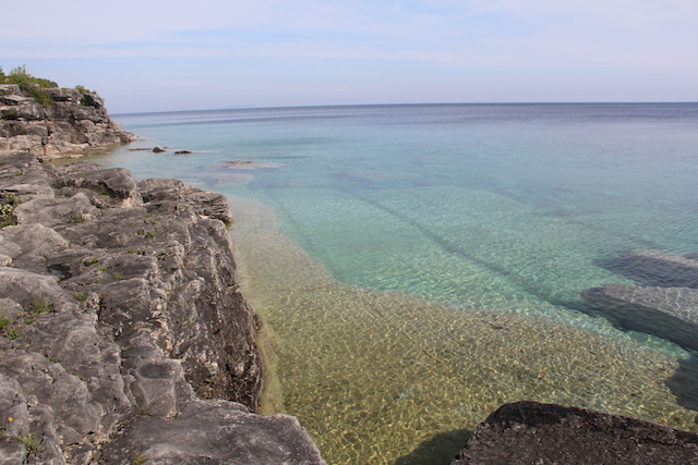 The water may look tropical, but let me assure you it was freezing. So cold it actually hurt. (Also, the colours in this photo aren't edited at all.)