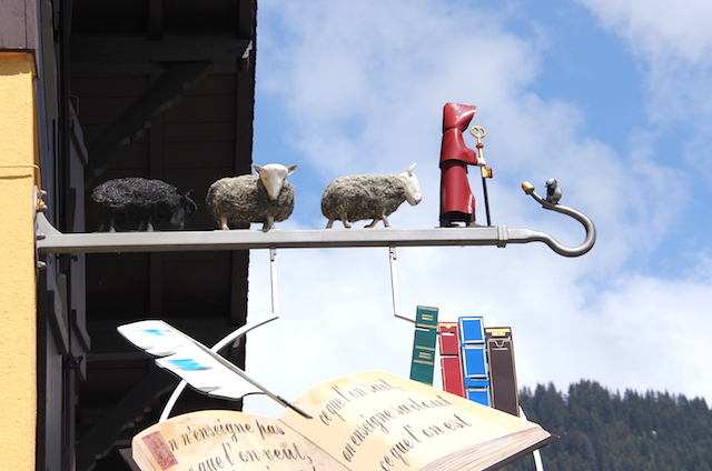 Funny, sheepy sign above a little restaurant in Villars, Swizerland.